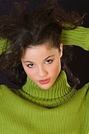 Young girl portrait with green pullover