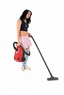 Yung girl with vacuum cleaner. White background