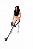 Yung girl with vacuum cleaner. White background