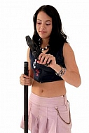 Yung girl with vacuum cleaner. White background