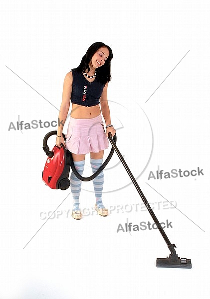 Yung girl with vacuum cleaner. White background