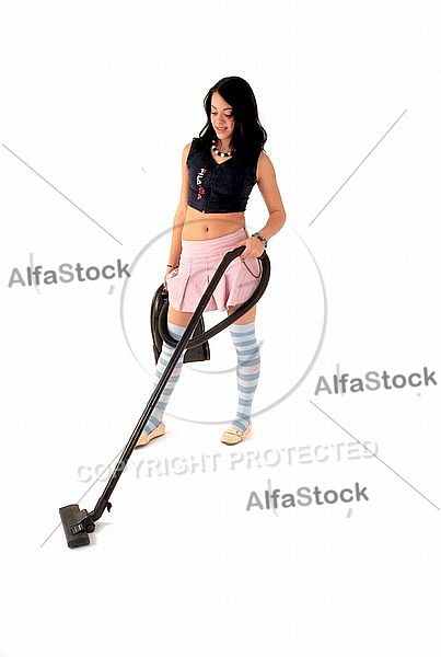 Yung girl with vacuum cleaner. White background