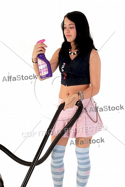 Yung girl with vacuum cleaner. White background