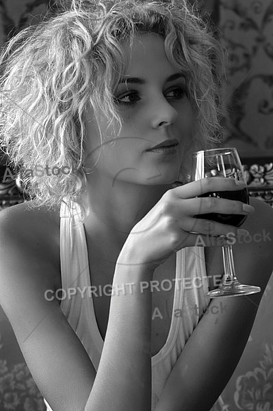 Black and white picture of a woman drinking