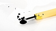 Fountain pen with black ink drops