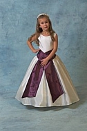 Girl in a white and purple dress