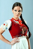 Girl with brown hair and national costume