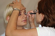 Makeup artist at her work