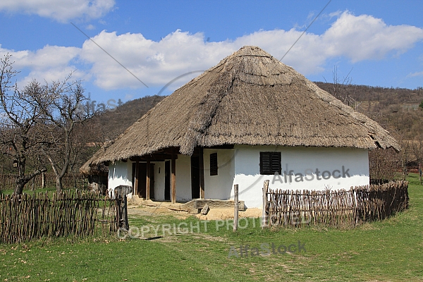 Rural thatched roof house in the hills.