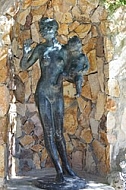Statuary, man with child