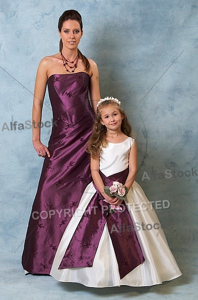 Woman and girl in purple and white Dresses