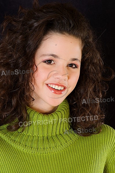 Young girl portrait with green pullover