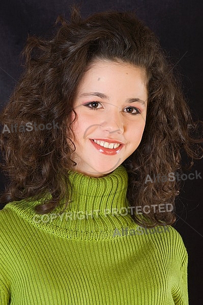 Young girl portrait with green pullover